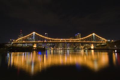Story Bridge by night with cityscape in background